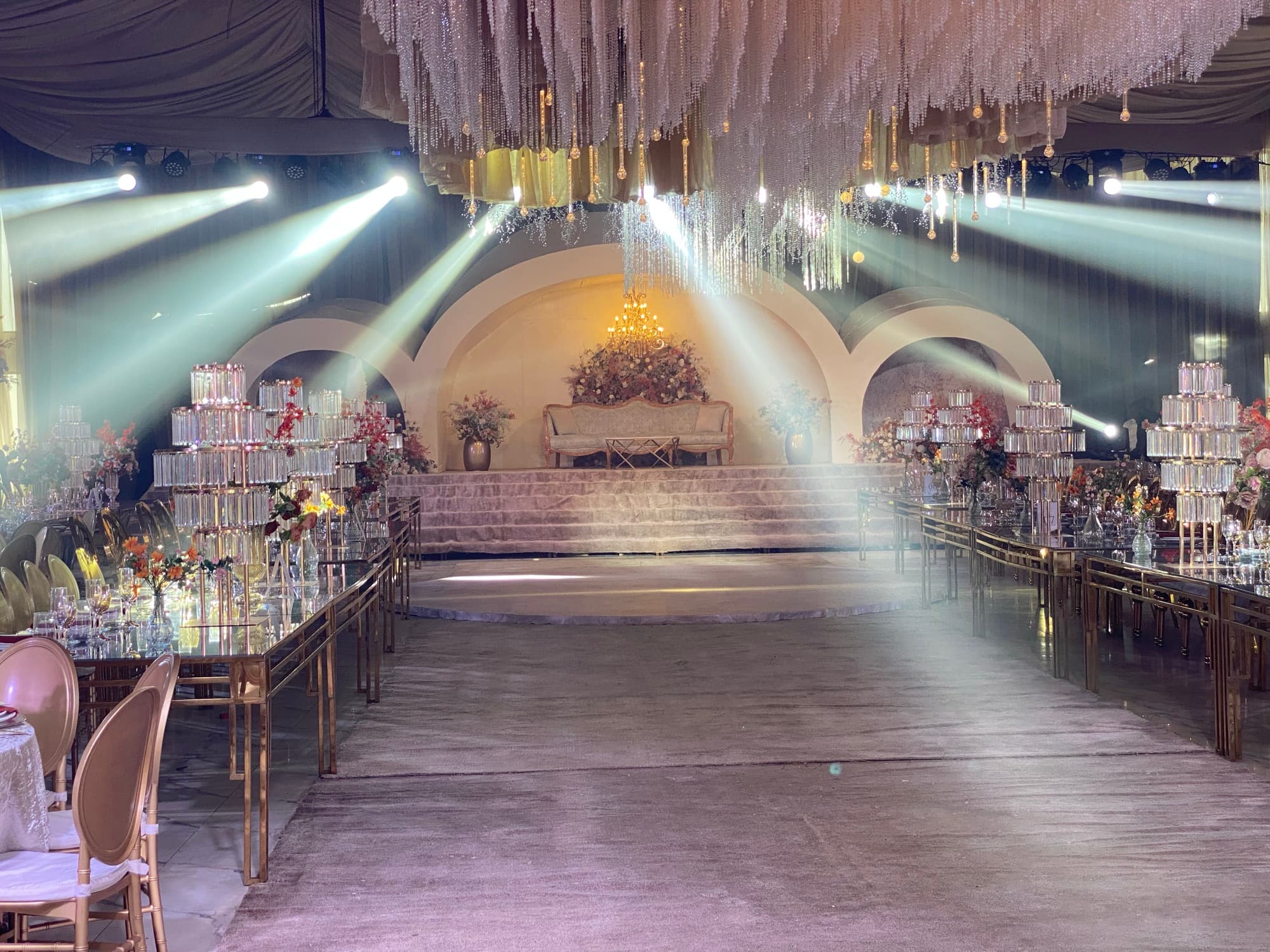 Hall of Odin — the hall dressed for a wedding, stage and long tables under chandeliers